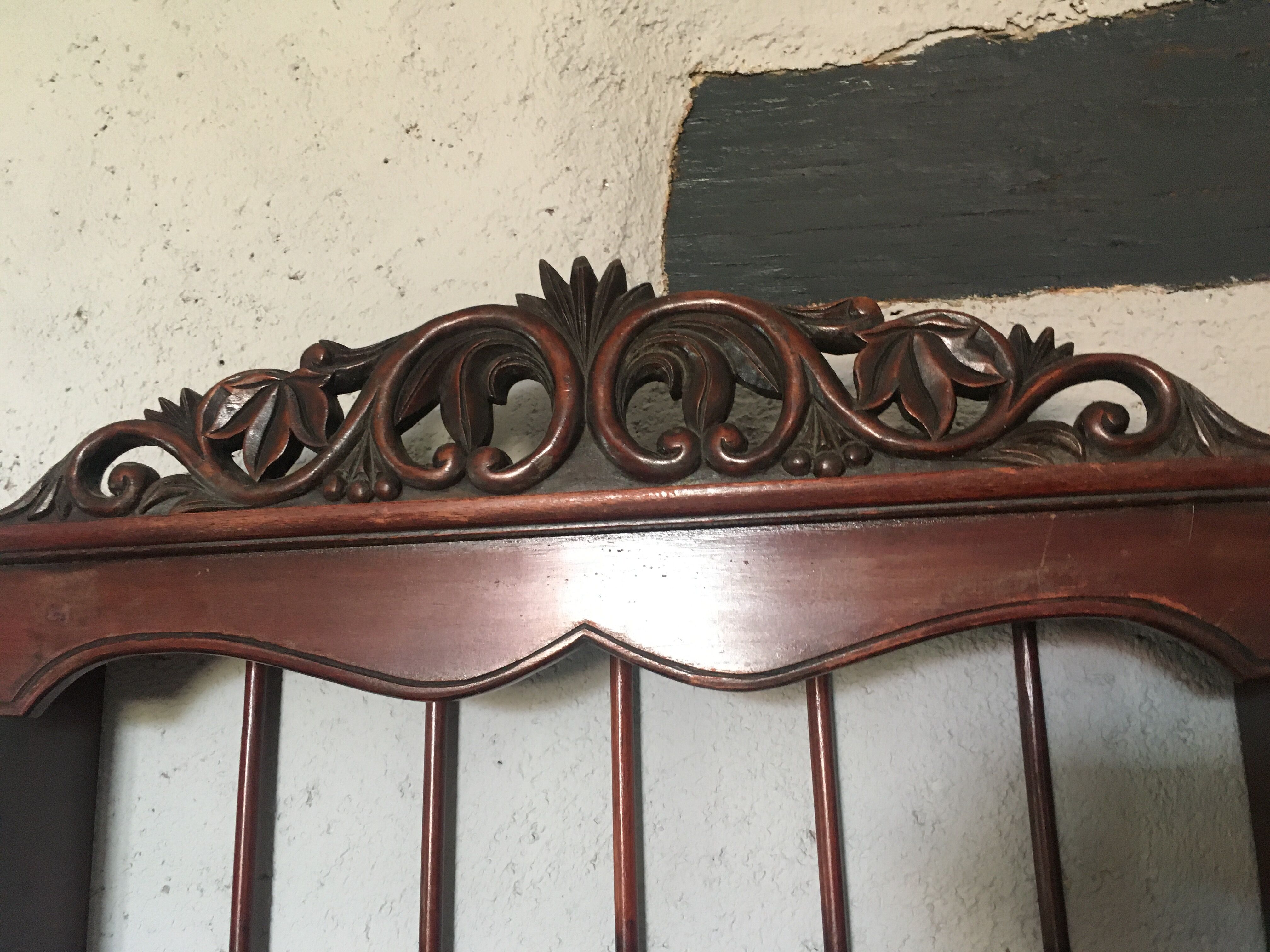 Carved wooden wall shelf for collection or other.