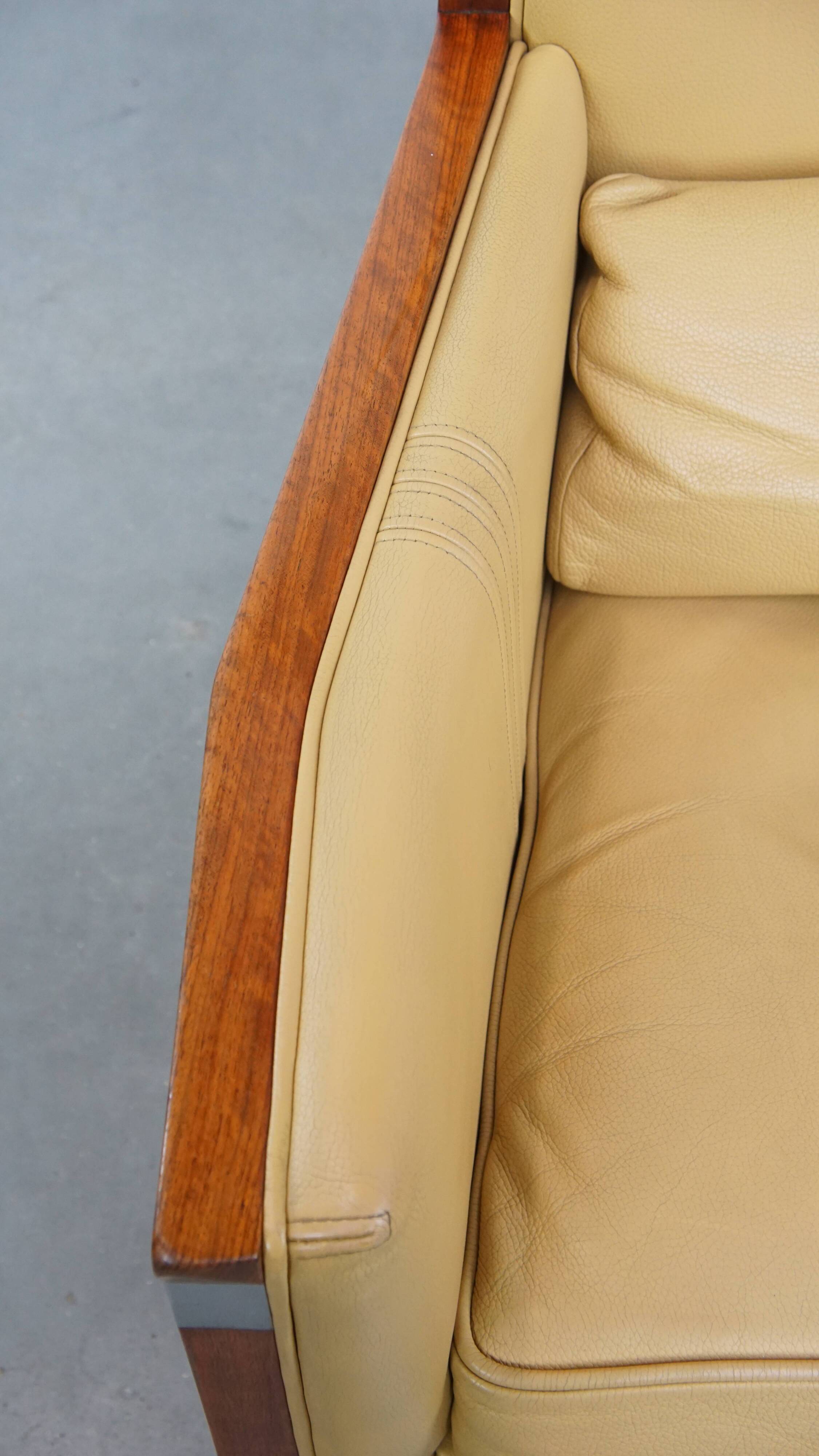 Art Deco armchair in yellow leather with high back