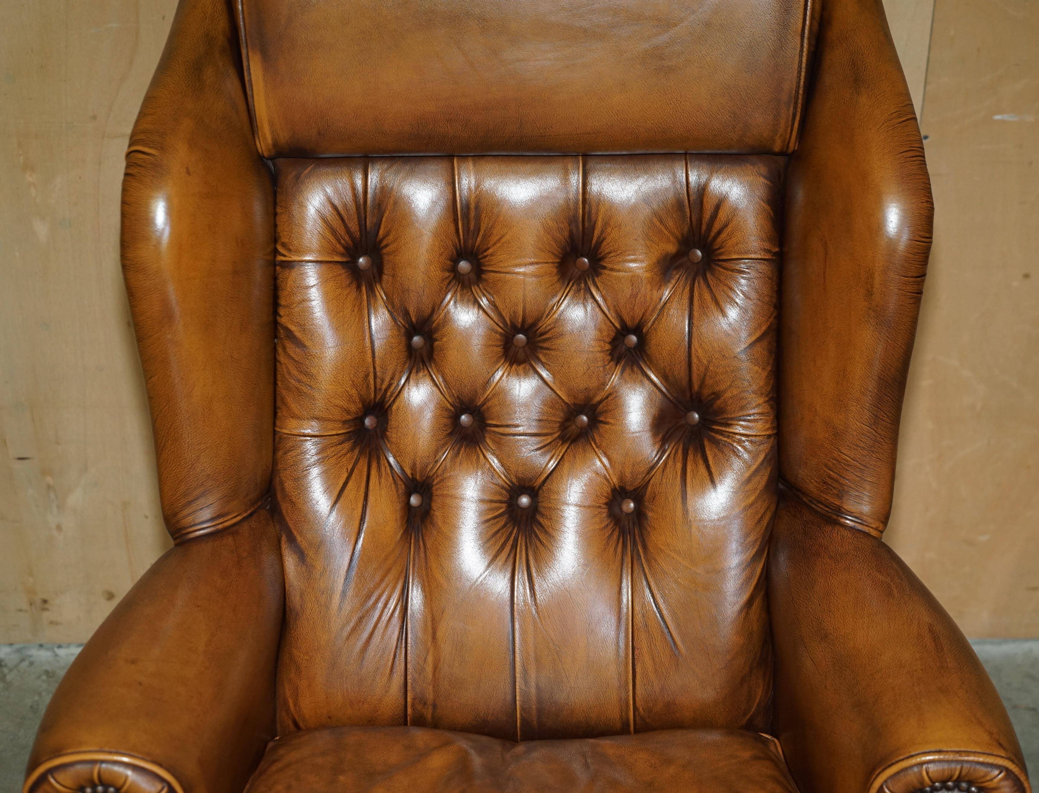 Captain's chair Chesterfield vintage leather with tufted wingback.