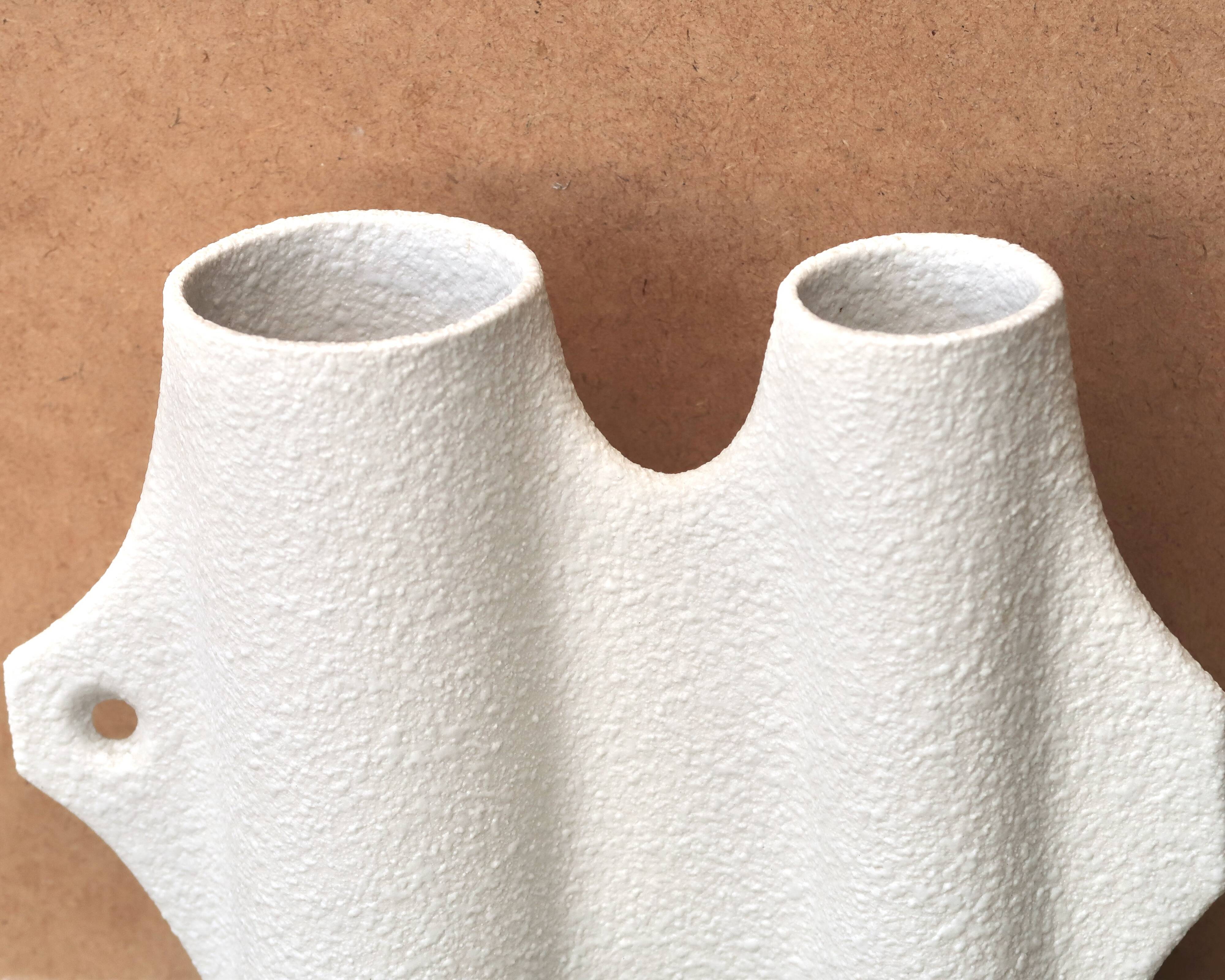 Sgrafo Modern sculptural white porcelain vase by Peter Muller