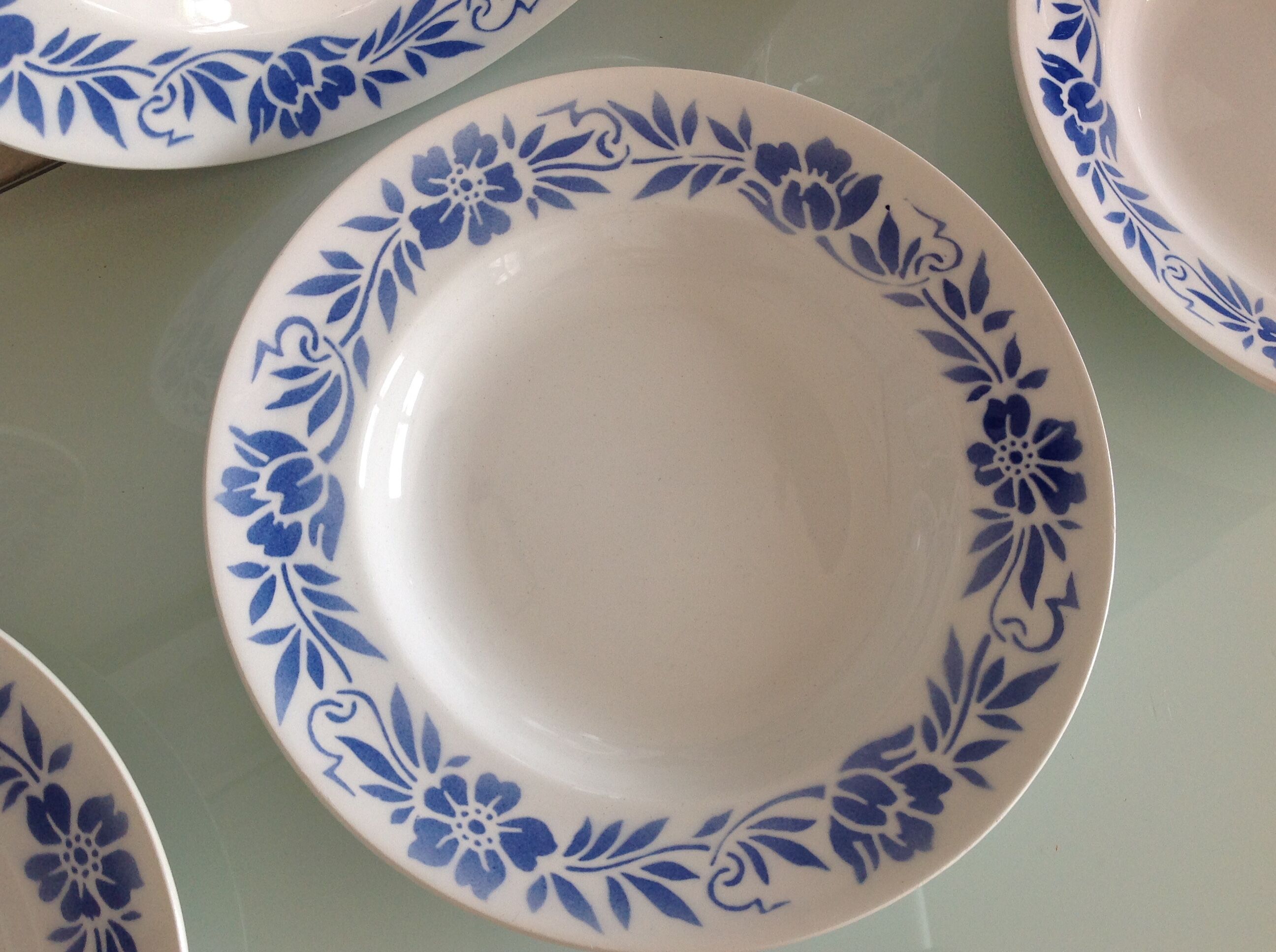 Suite of six white hollow plates with blue flowers by Moulin des Loups / vintage years 50-60
