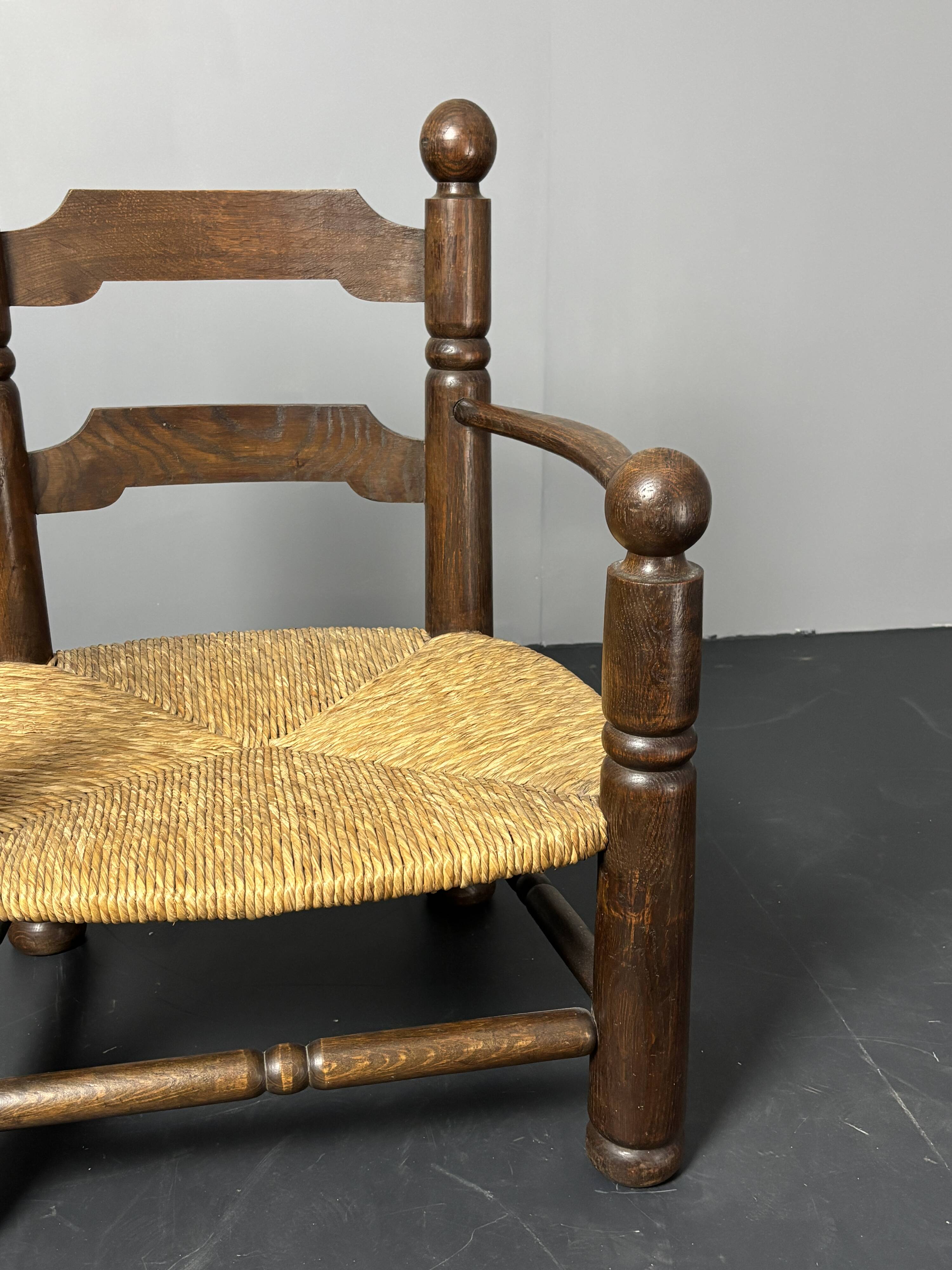 Brutalist French low rush oak side armchair by Charles Dudouyt ca 1940s