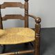 Brutalist French low rush oak side armchair by Charles Dudouyt ca 1940s