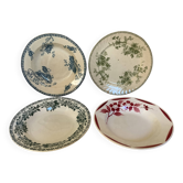 Four old earthenware plates