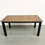 Solid oak dining table from the 70s with metal legs