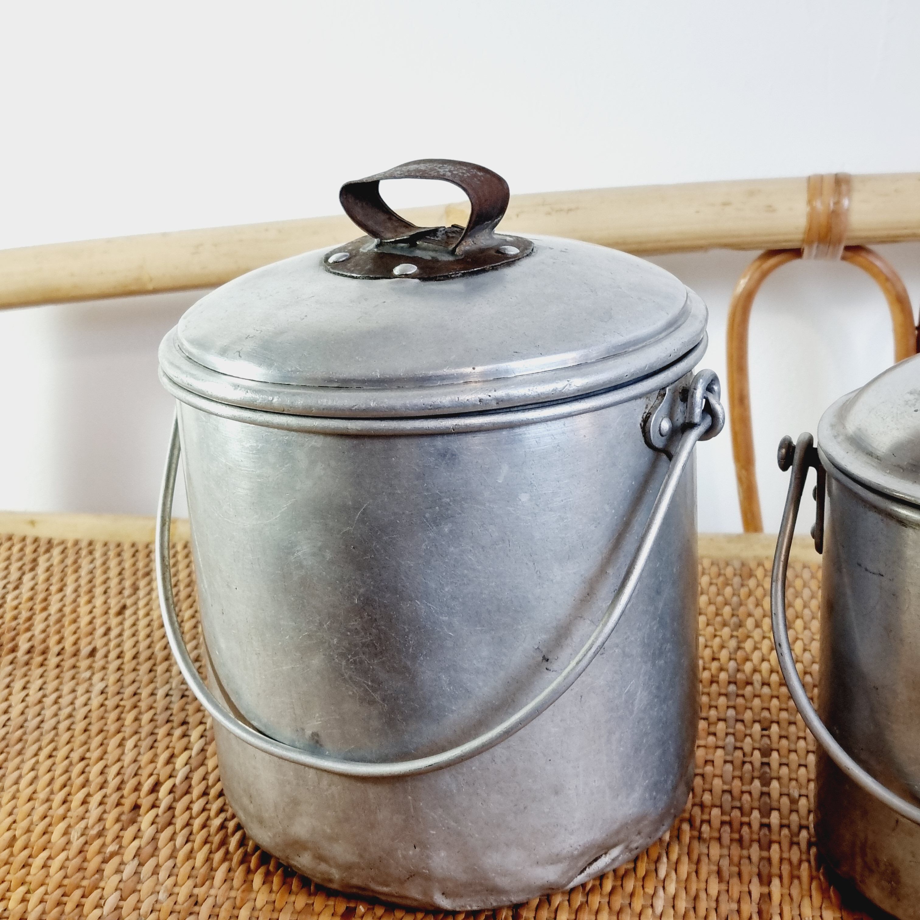 3 mismatched milk jars