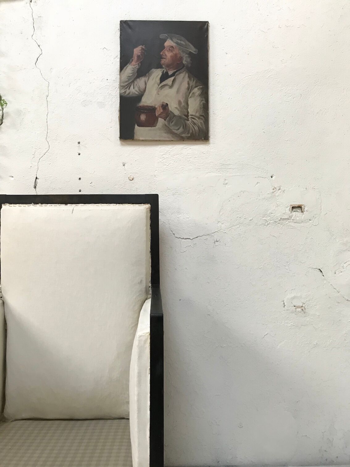 Pair of blackened wooden armchairs