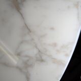 Tulip dining table in marble by Eero Saarinen for Knoll International.