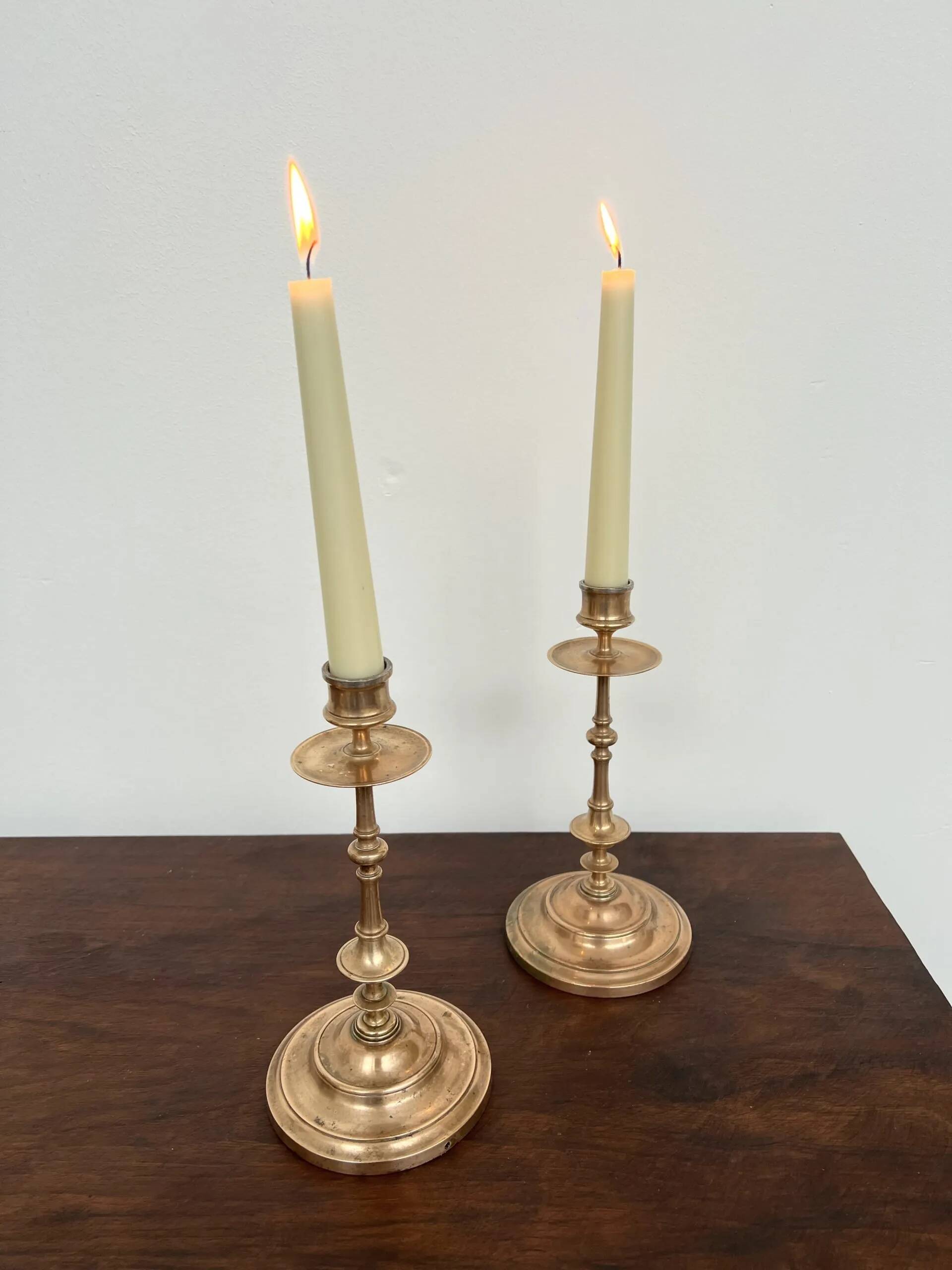 Pair of antique turned rose brass candlesticks (24 cm)