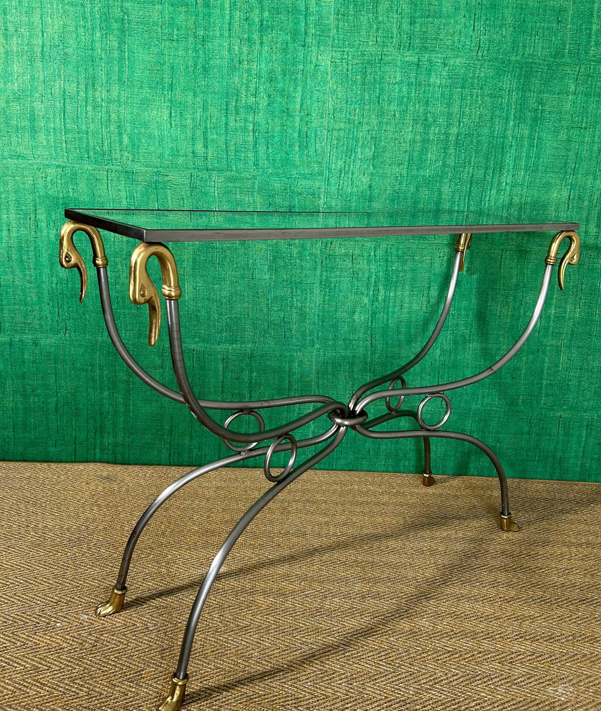 Polished steel and brass console, probably Maison Jansen, France, mid-century modern Hollywood Regency.