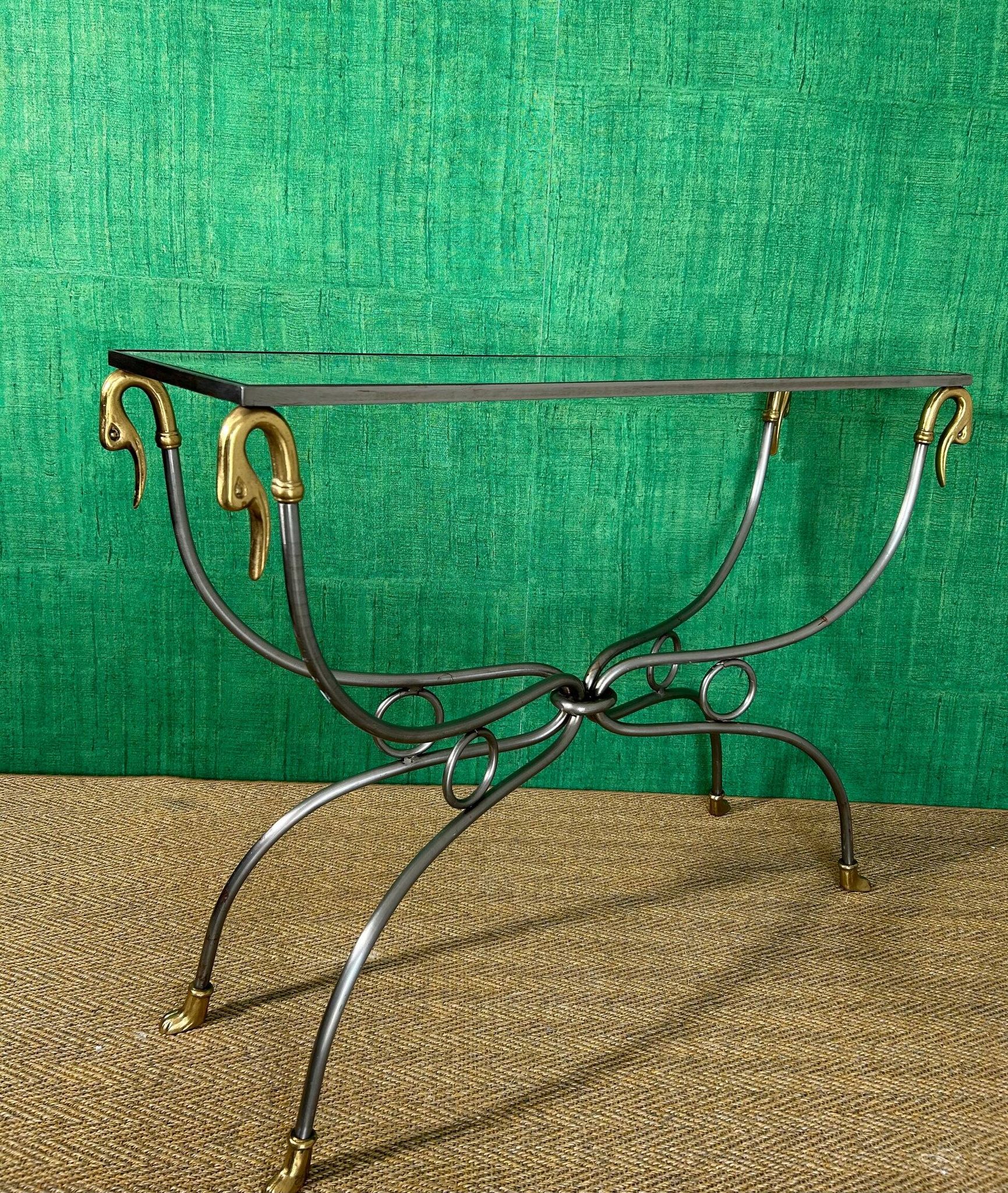 Polished steel and brass console, probably Maison Jansen, France, mid-century modern Hollywood Regency.