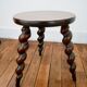 Tabouret tripode pieds torsadés