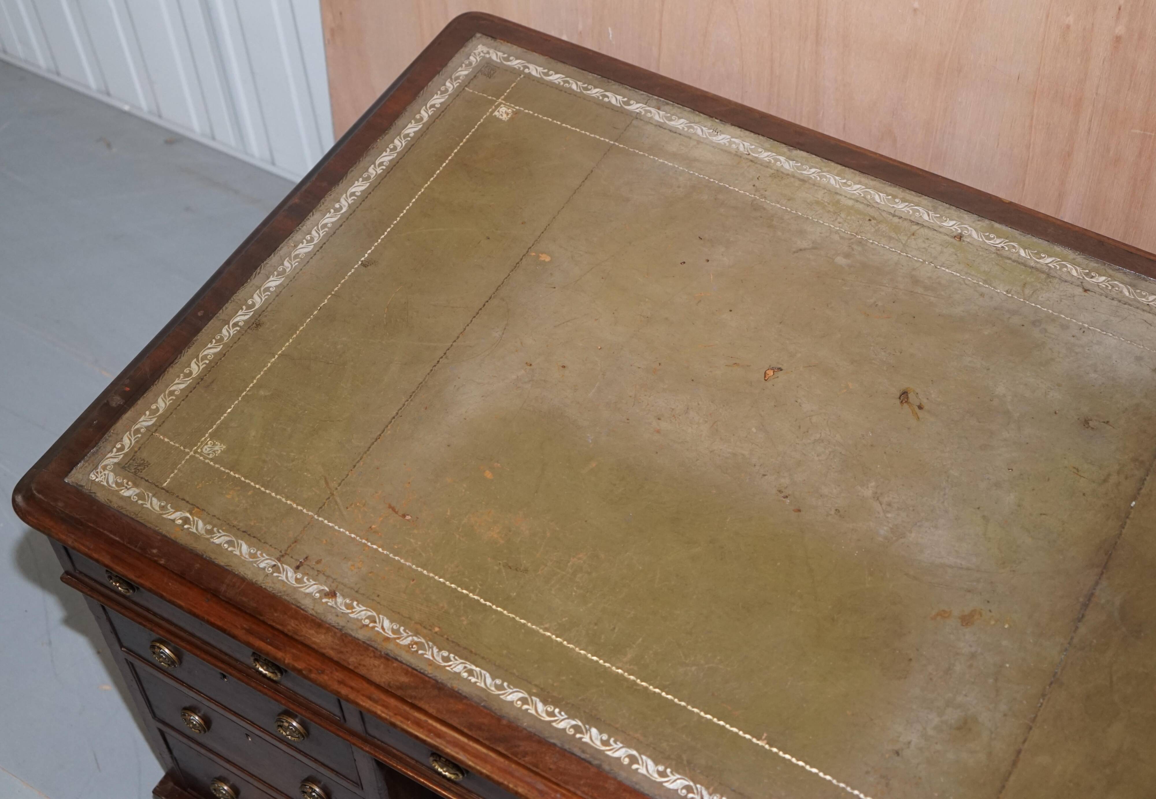 George III double-sided partner's desk in walnut circa 1780 with original handles.