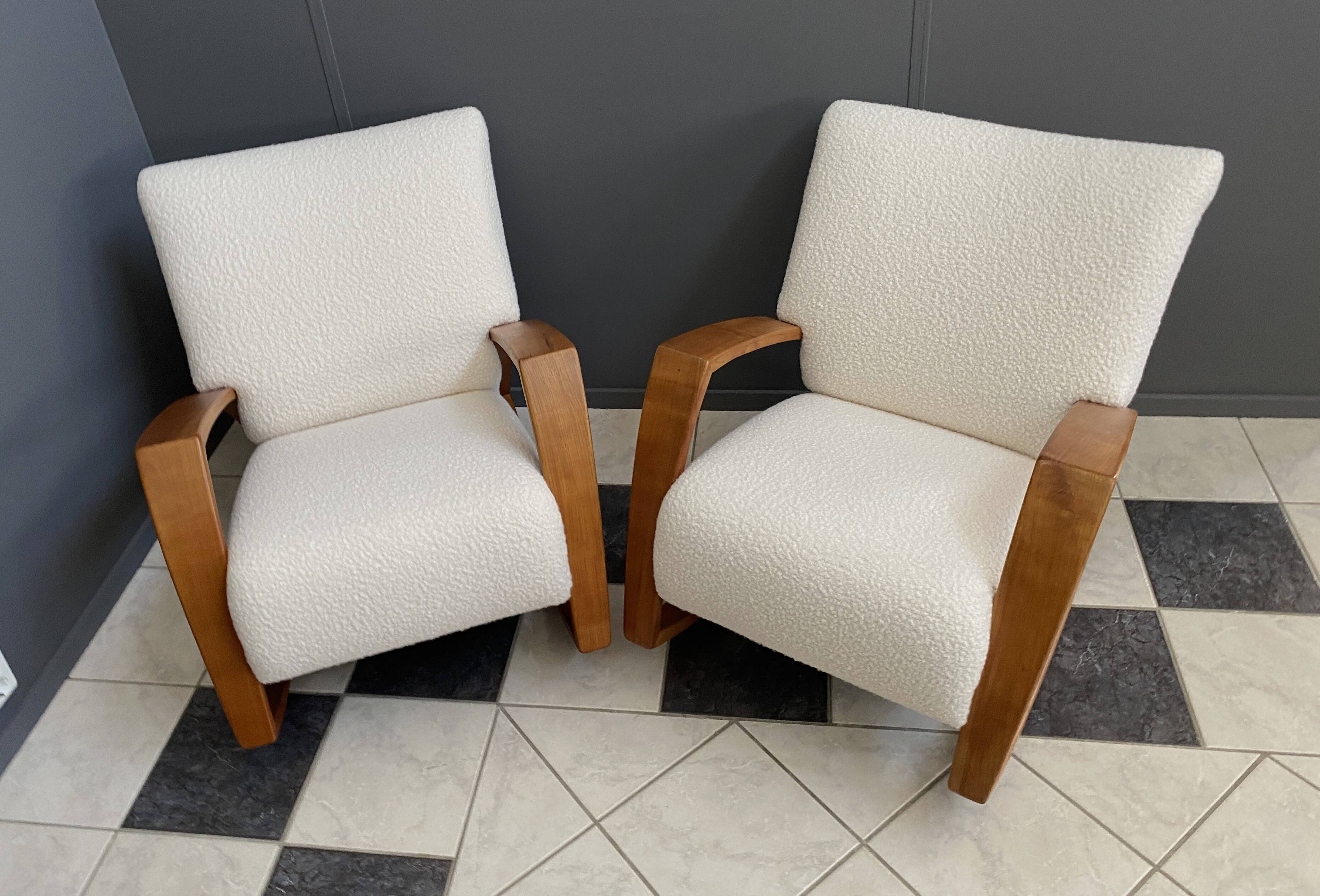 Pair of large rocking chairs reupholstered in White Boucle