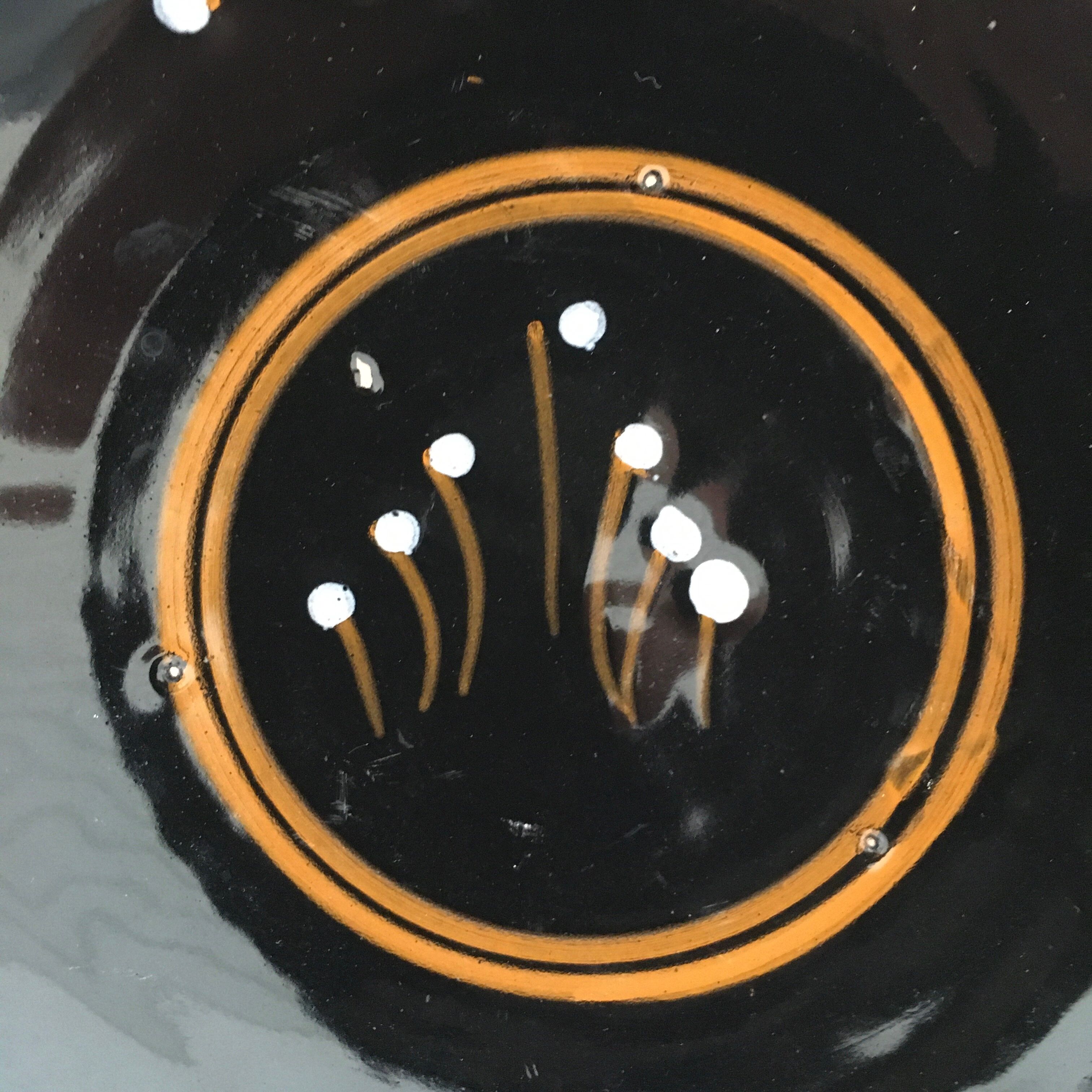 Set of 3 black decorative deep plates.