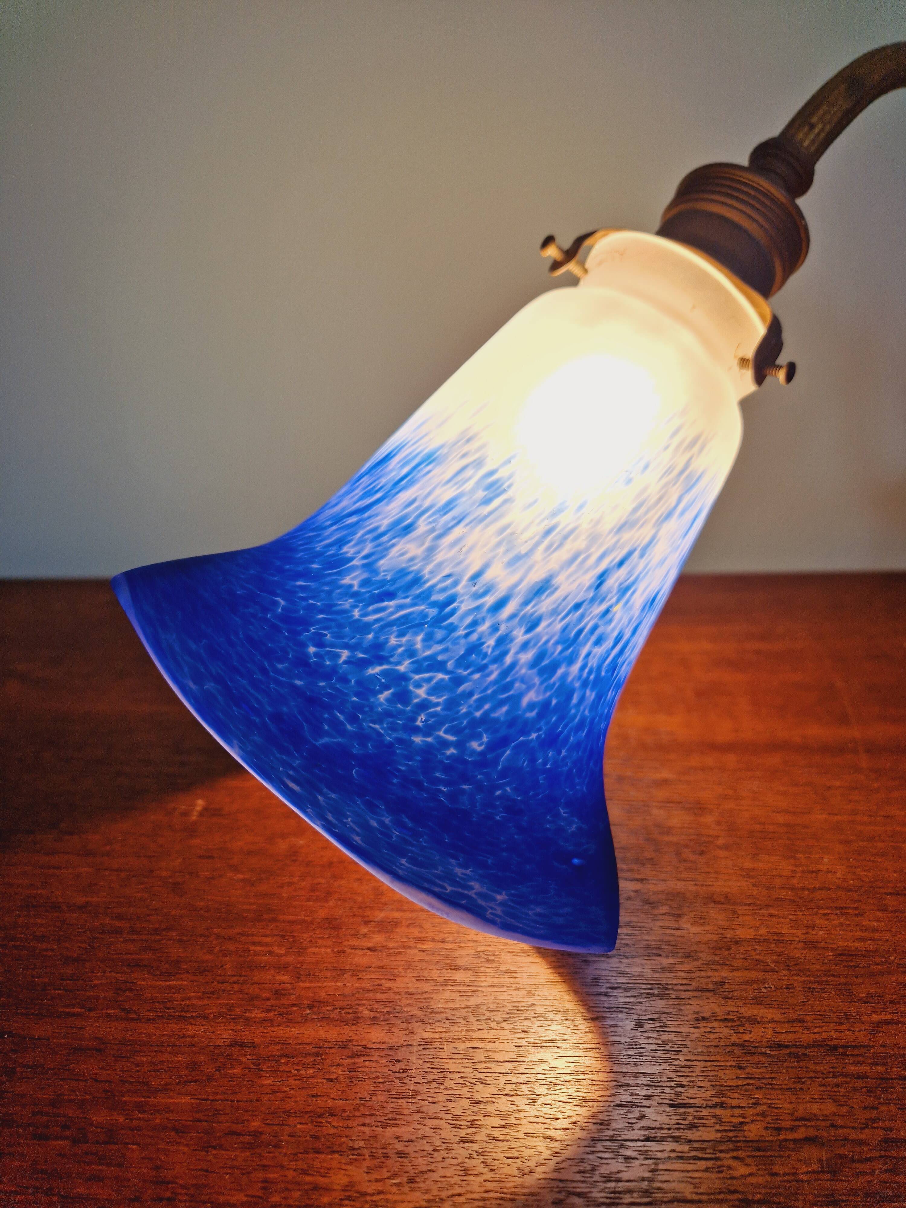 Wall light in gilded bronze and blue marmoreal glass, early 20th century