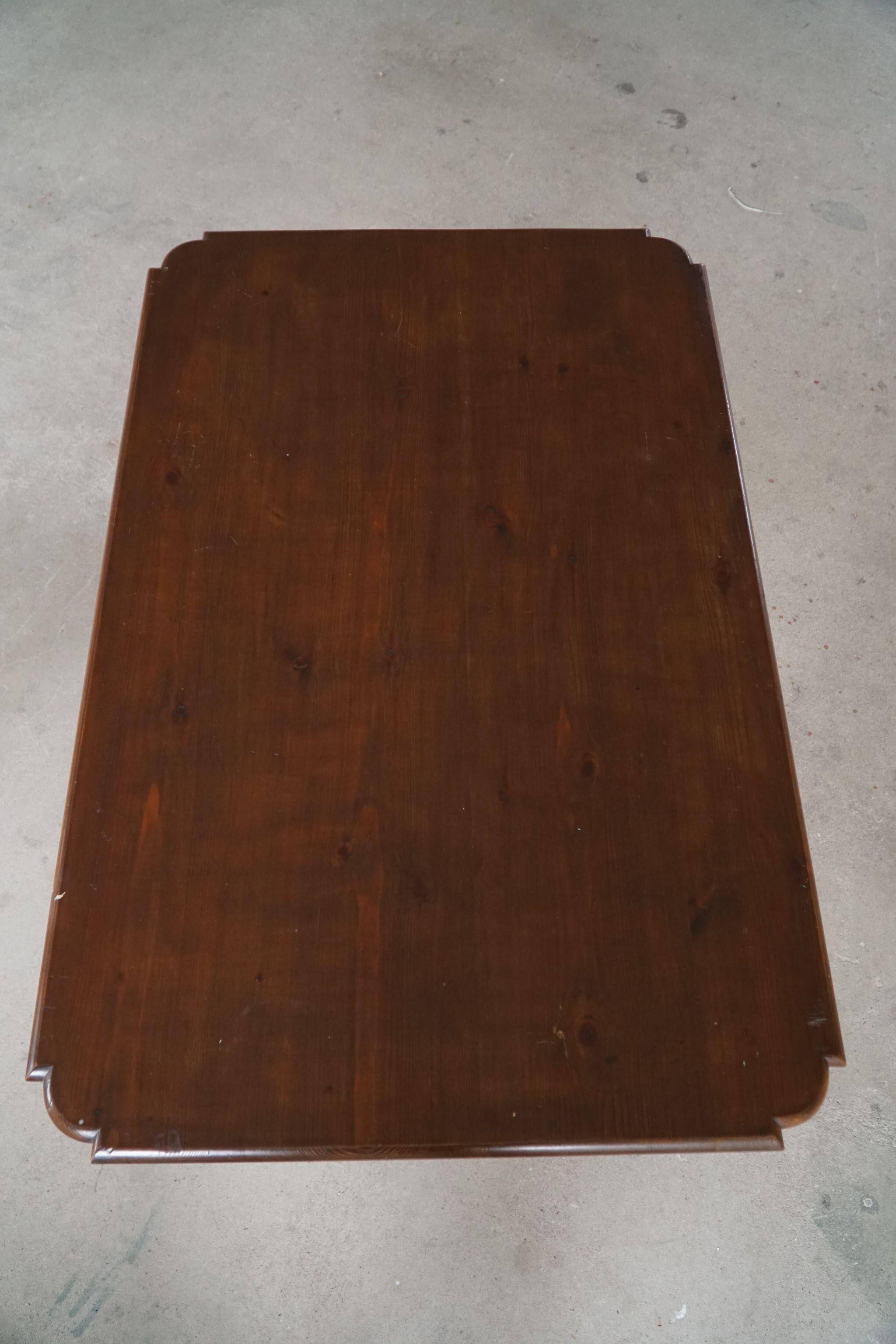 French sculptural desk in stained pine, early 20th century, Baroque style.