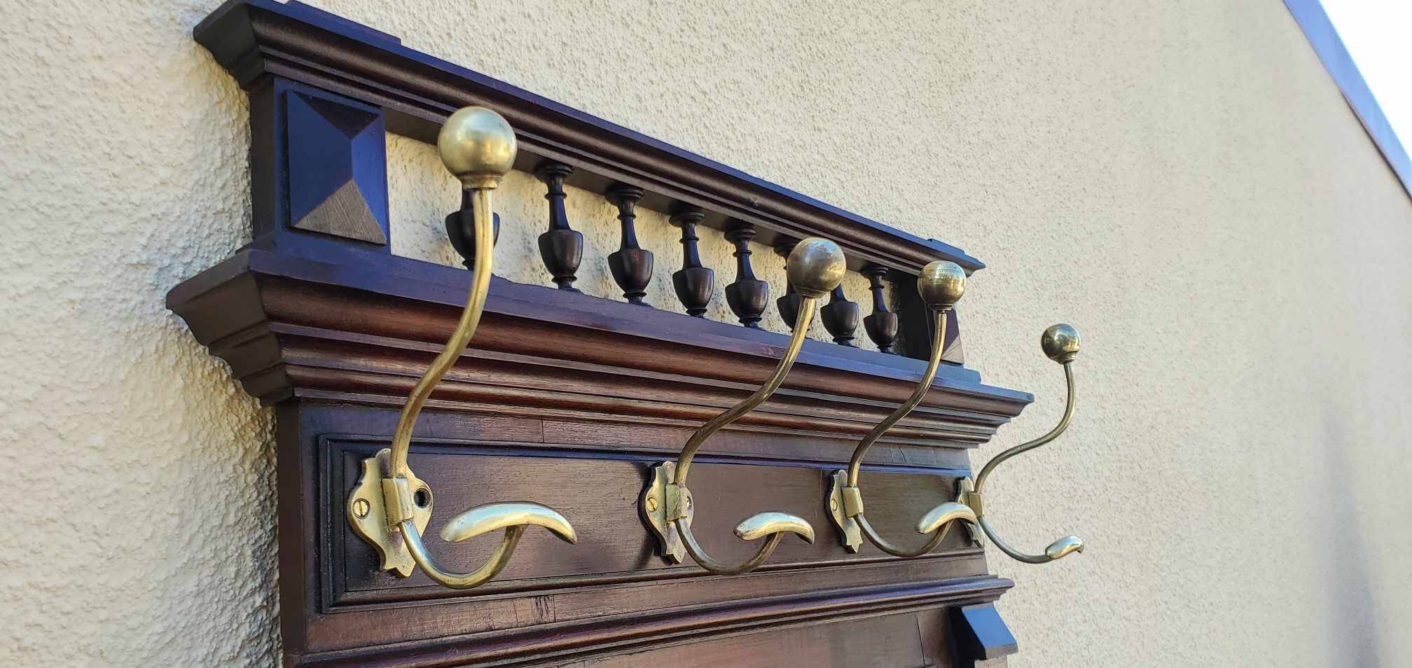 Old and beautiful wooden coat rack cloakroom early 20th century