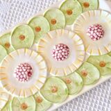 Large vintage cake dish in exotic fruit barbotine signed GV