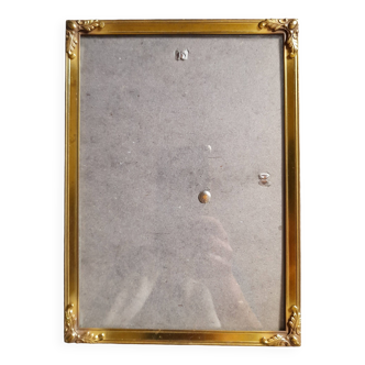 Antique gilded brass frame with embossed gold leaves