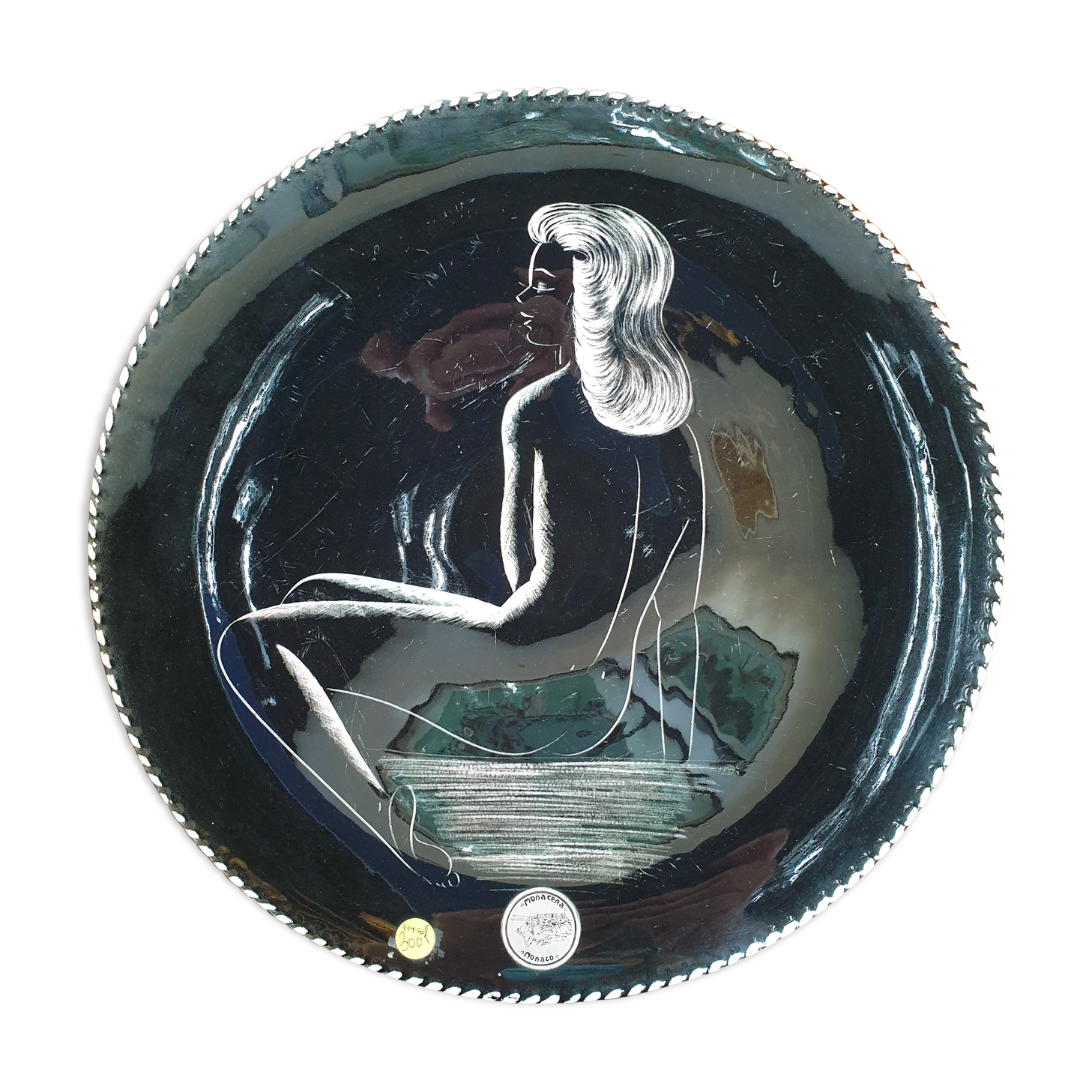 Ceramic dish nu feminine on black background