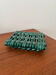 Vintage woven green ceramic trivet from the 70s, handmade.