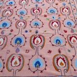 Salmon pink suzani kilim rug with embroidered patterns