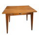 Old wooden desk or side table with compass legs