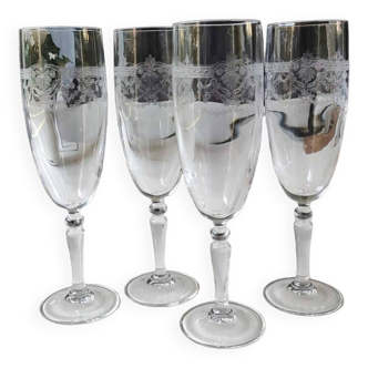 Lot 4 large champagne flutes, cristal d arques, dampierre model. empire/regency style. high 19 cm
