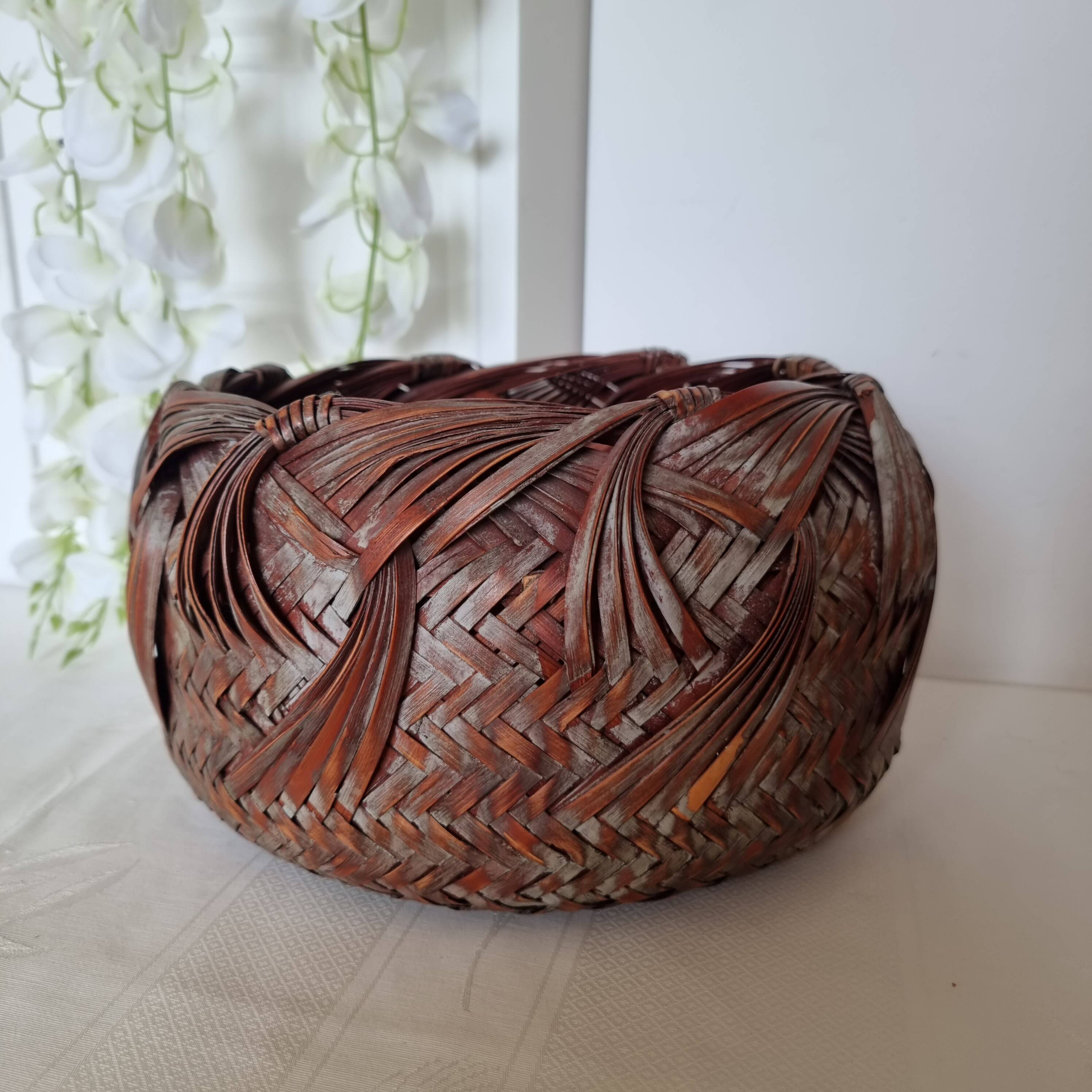 Vintage Japanese Ikebana basket made of smoked bamboo in natural