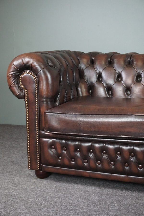 Chesterfield sofa in cowhide, 4 seats