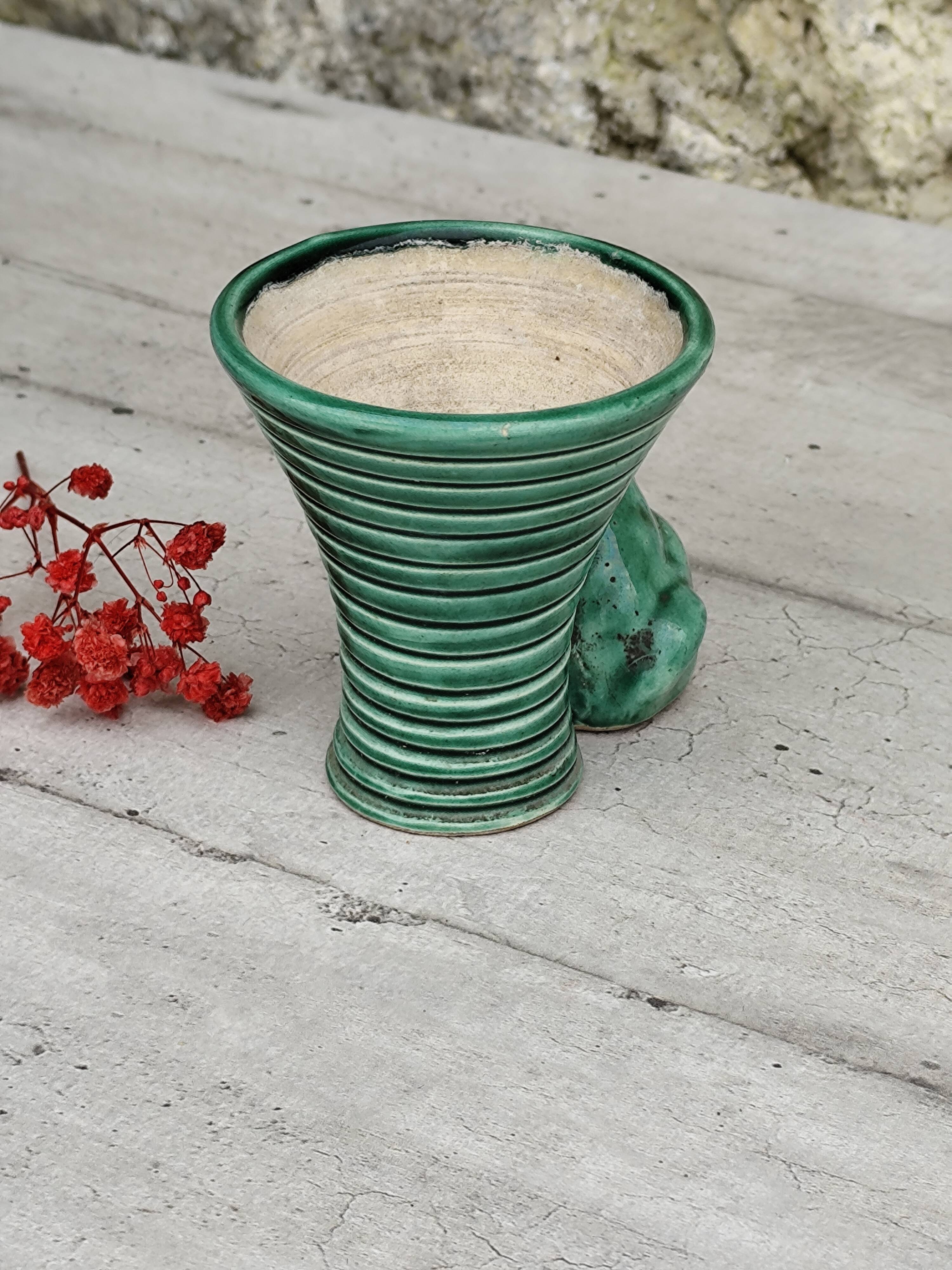 Green ceramic empty pocket dog statue