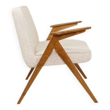 Vintage armchair in rustic oak with pearl bouclé, designed by Chierowski.