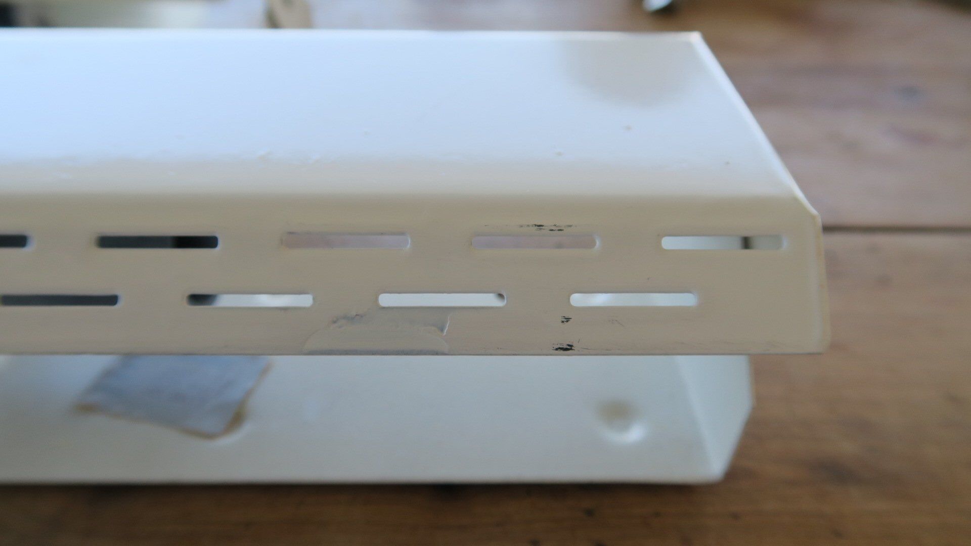 Wall lamp with red swivel shutter