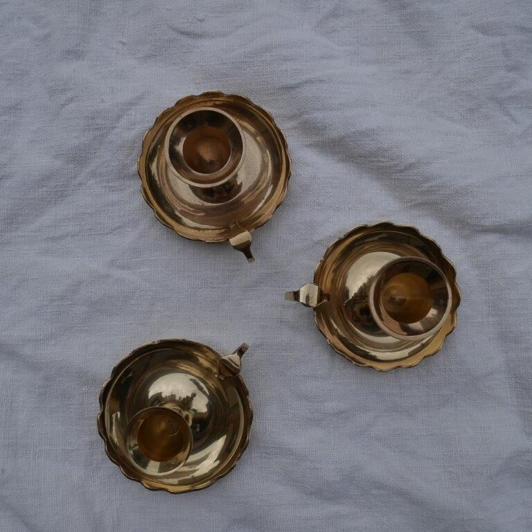 Brass candlesticks, cellar rat models