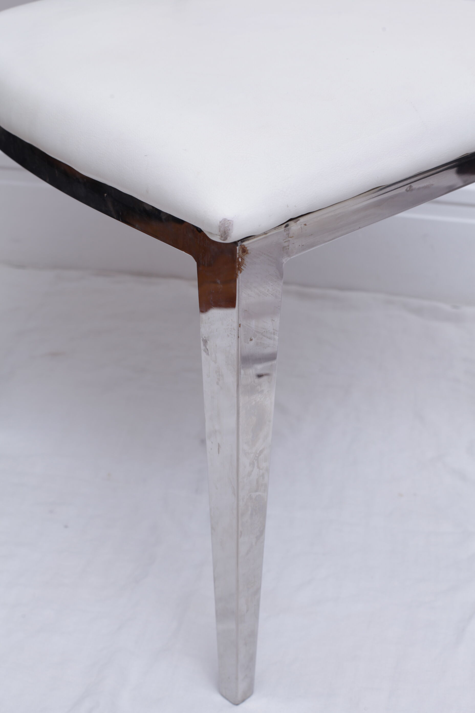 White skai chair and chrome legs