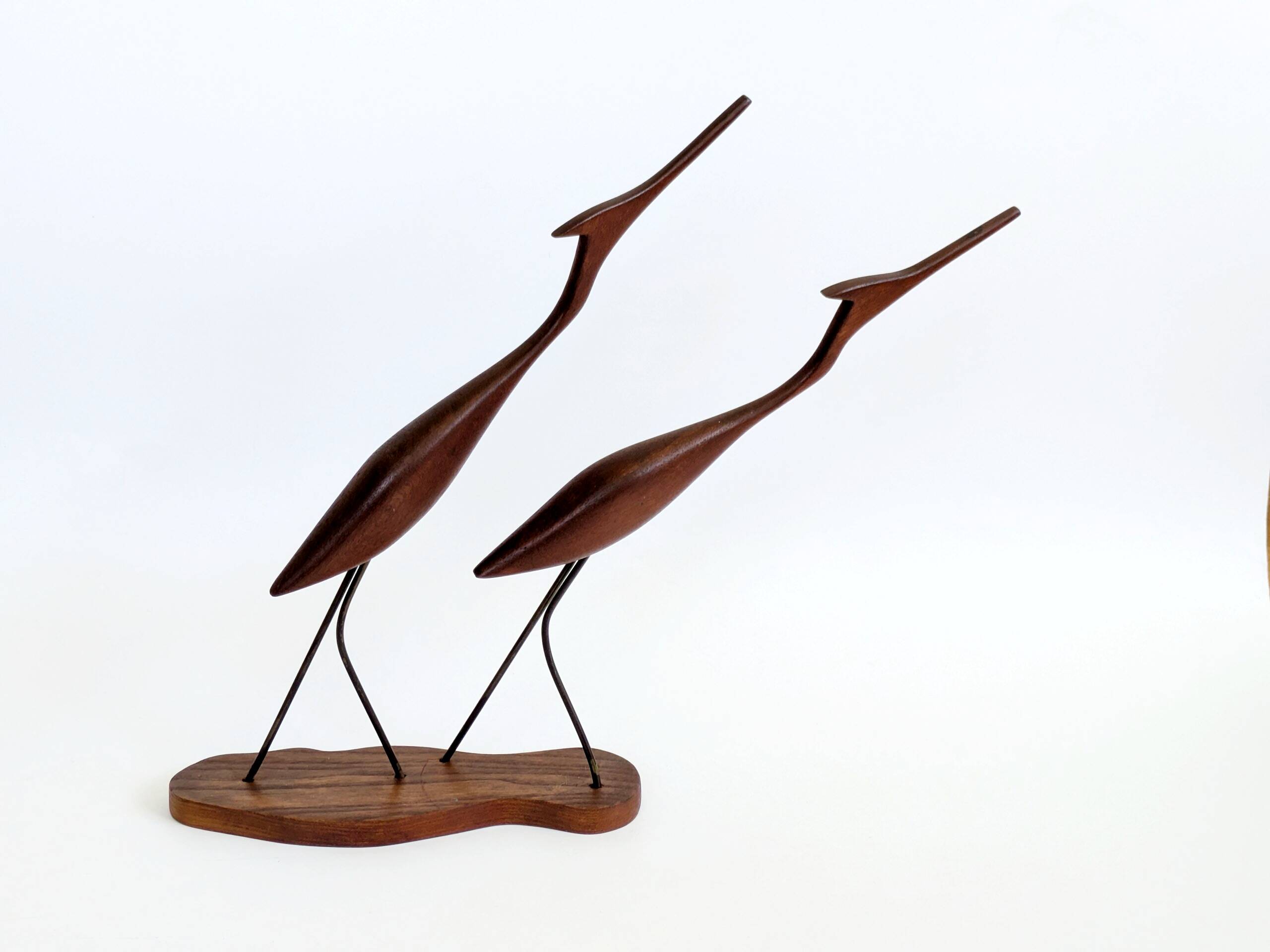 Scandinavian modernist sculpture cranes in teak.