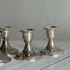 4 vintage metal candle holders