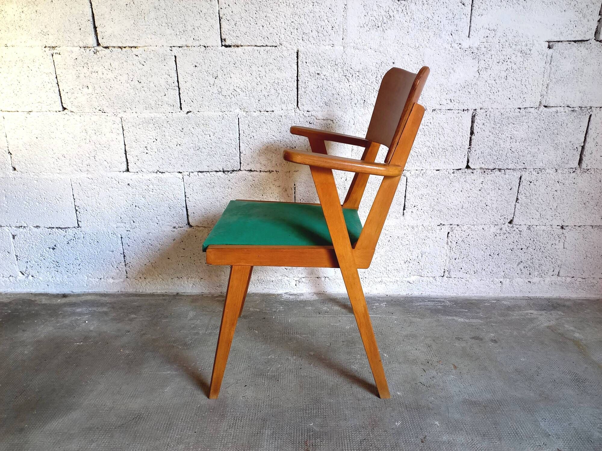 Vintage armchair in skai and wood 60s