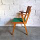Vintage armchair in skai and wood 60s