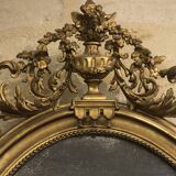 Miroir ovale doré à la feuillle