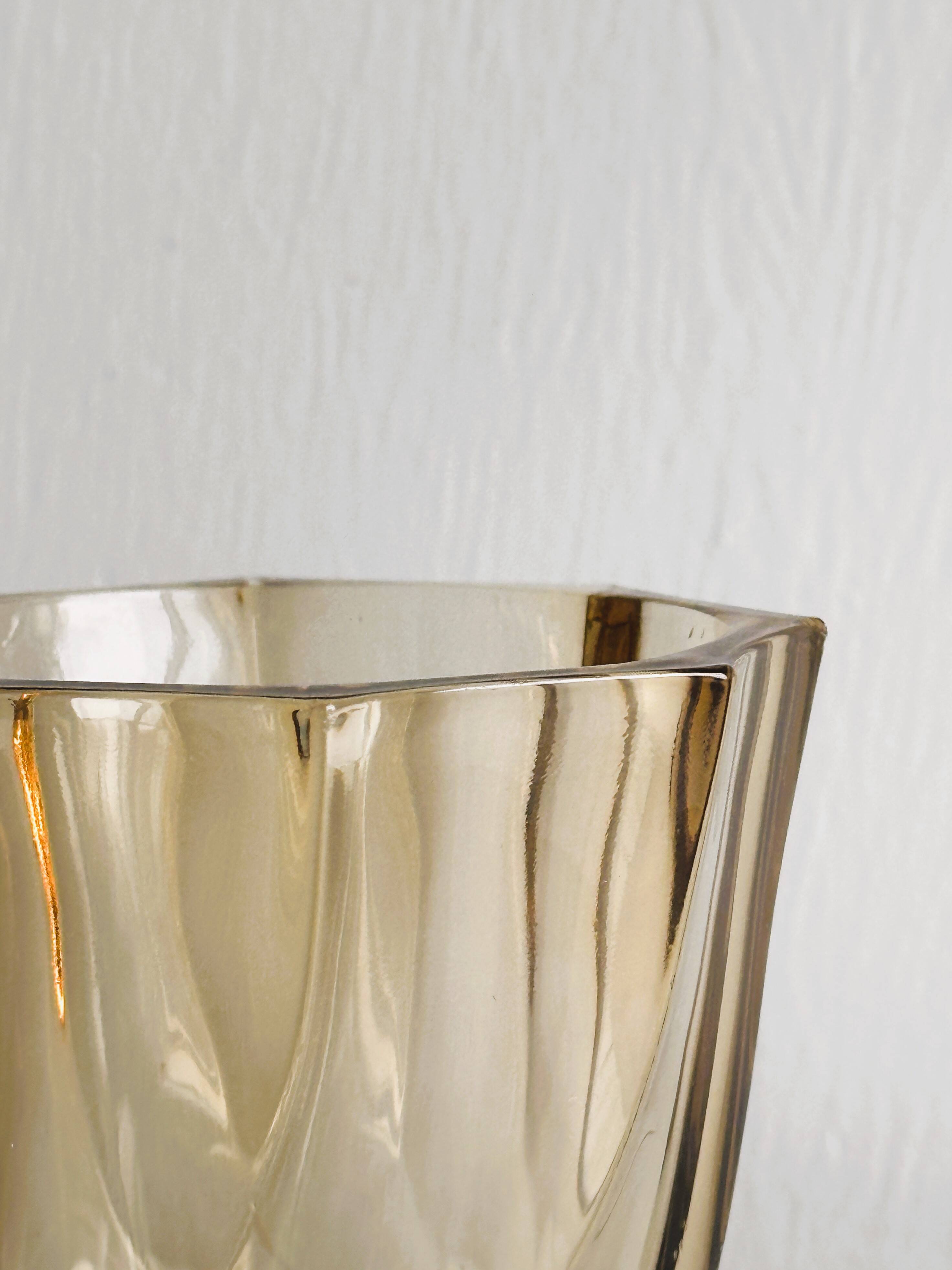 Small translucent pink twisted glass vase