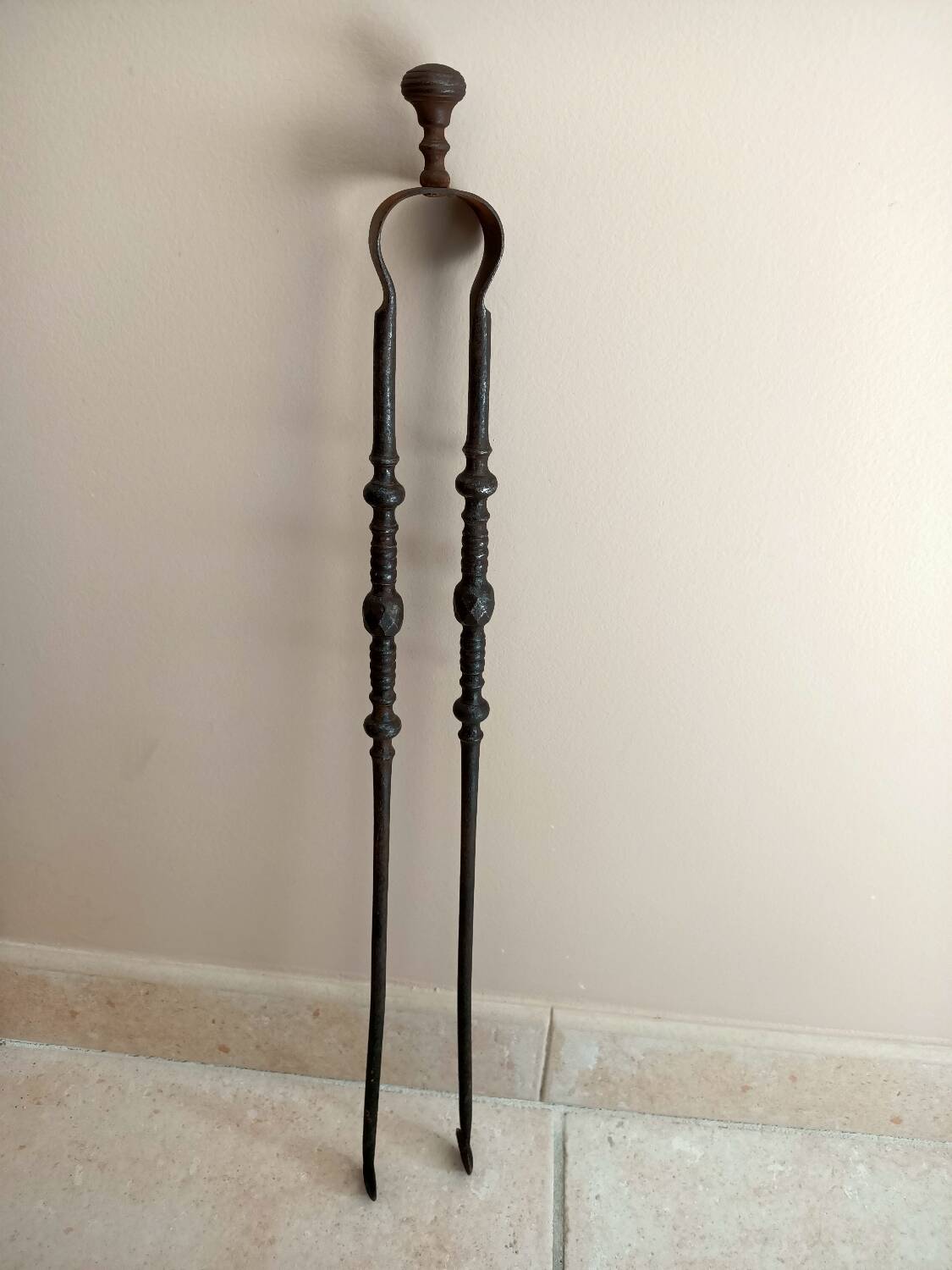 18th century fireplace tongs in wrought iron