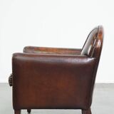 Characterful vintage design armchair made from beautifully patinated sheepskin