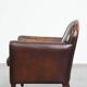 A vintage-style armchair with character, upholstered in beautifully patinated sheepskin.