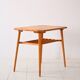 Decorative birch coffee table with magazine rack