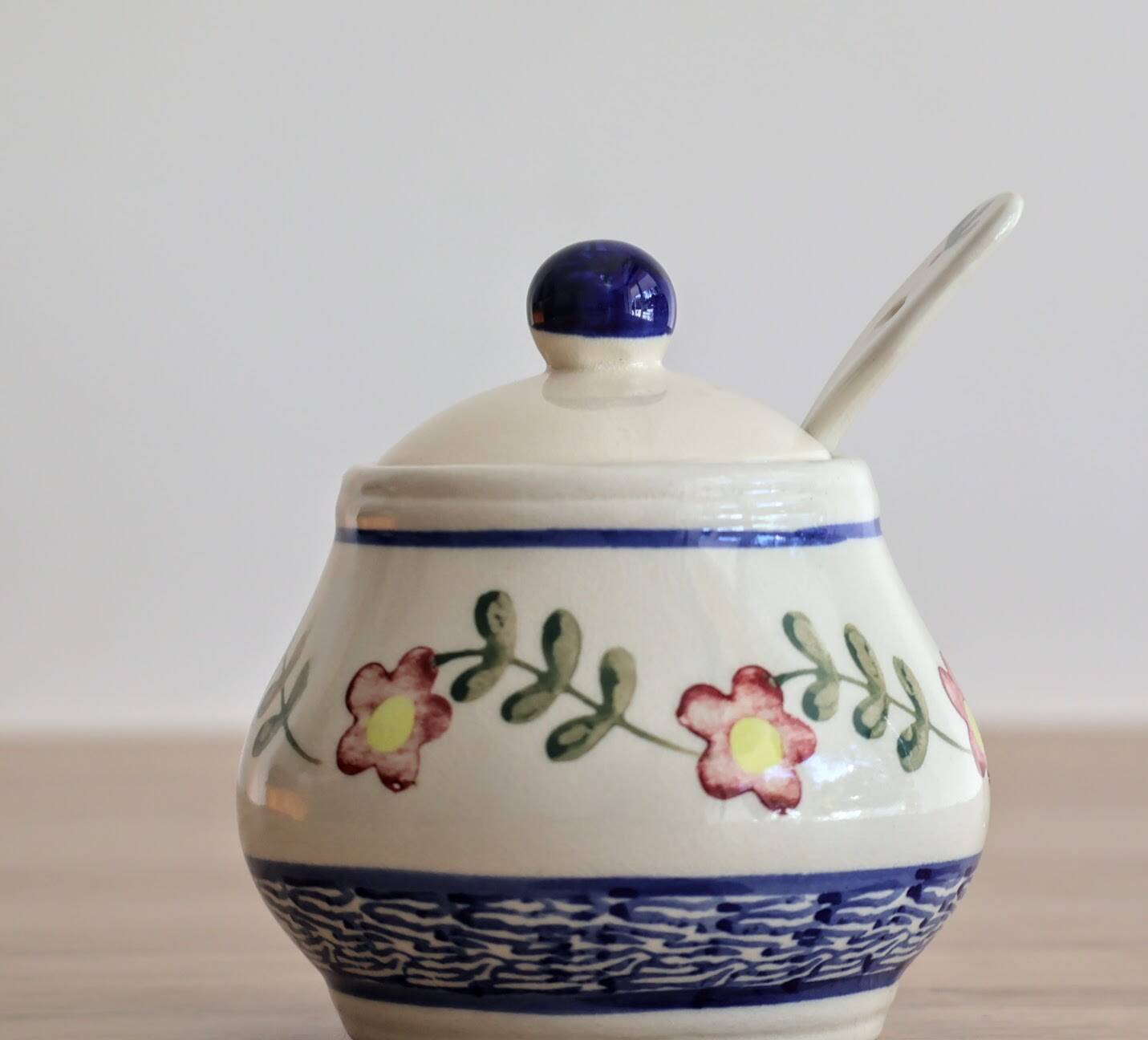 Ceramic jam pot with floral decoration