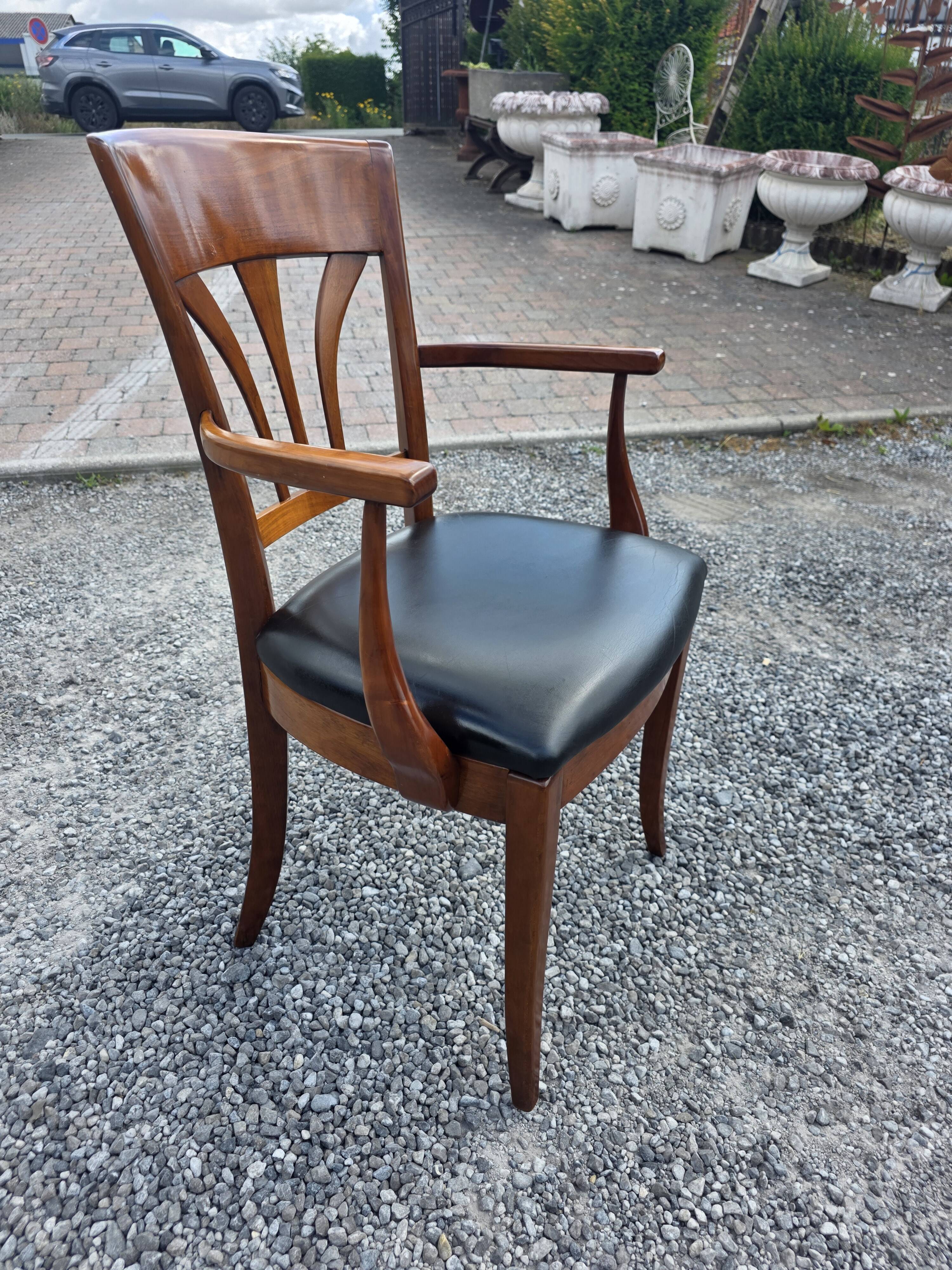 Mid-20th century solid cherry wood office chair.
