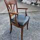 Mid-20th century solid cherry wood office chair.
