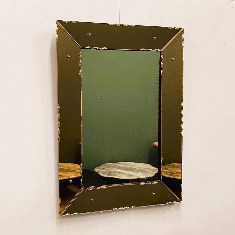 Striking French amber-coloured mirror with sculpted edge details, 1940s